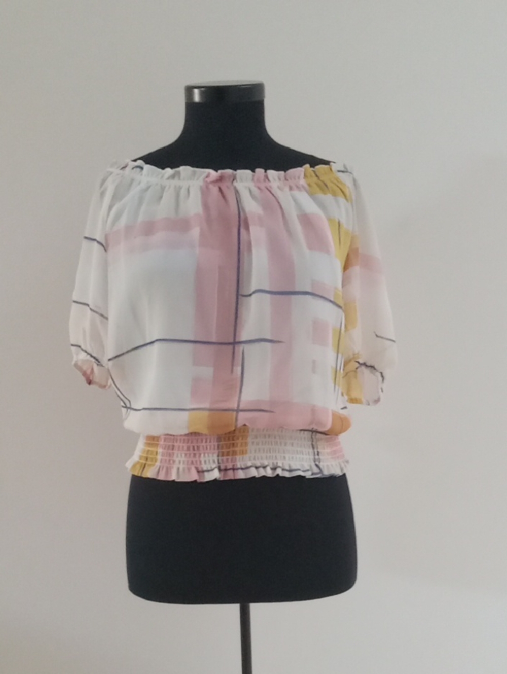 Ricki's White Off-Shoulder Geometric Print Blouse with Pink and Yellow Accents